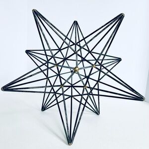 Vintage 3D metal start wirh gold accesnts.